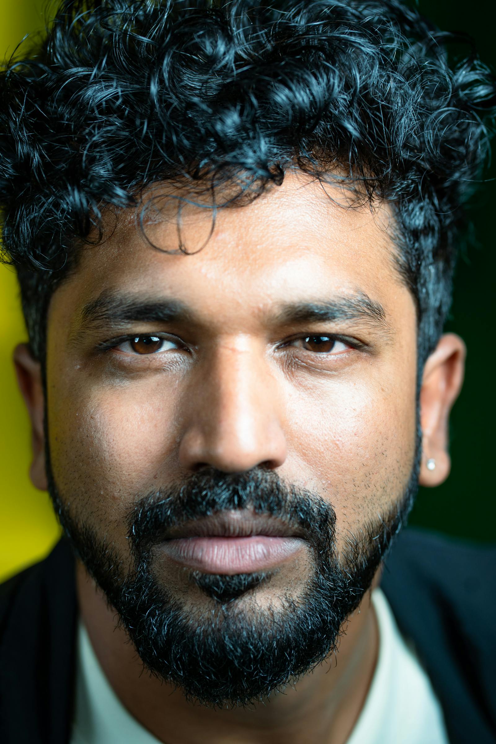 Professional headshot with clean backdrop